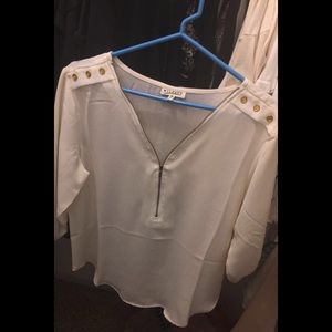 White. Medium. Cuffed wrists.